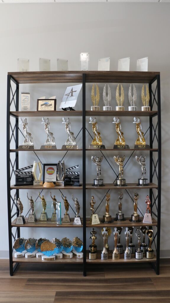 Collection of awards representing QA Graphics achievements